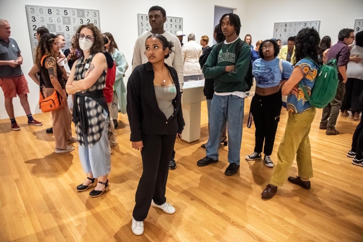 audience viewing the artwork at the Nasher